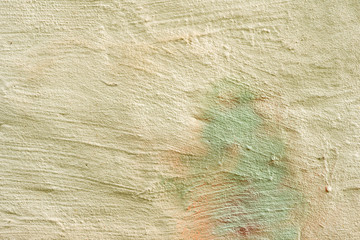 Texture of a concrete wall with cracks and scratches which can be used as a background