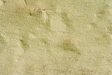 Texture of a concrete wall with cracks and scratches which can be used as a background