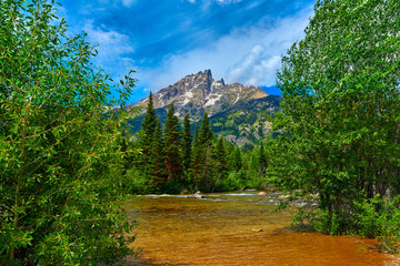 Cottonwood Creek  with view of the Teewinot Mountain.