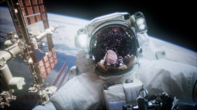 Astronaut at spacewalk. Elements of this image furnished by NASA
