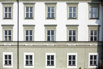 Obraz premium Many windows on a building facade