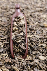 Fermented dry green tea leaves.