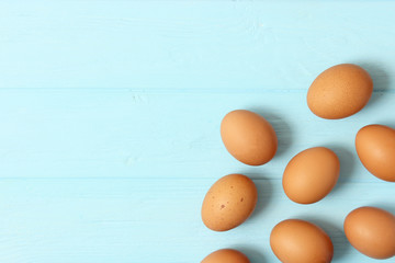 chicken eggs on a colored background. Farm products, natural eggs.