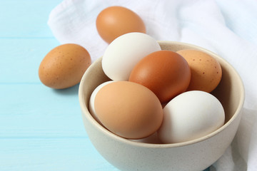 chicken eggs on a colored background. Farm products, natural eggs.