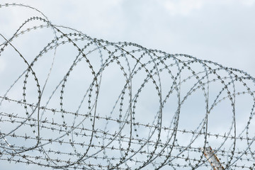 flat wrap razor wire with blue sky