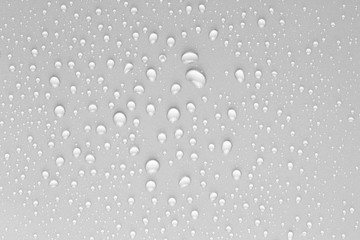 Drops of water on a color background