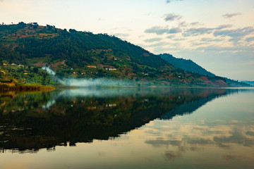 Symmetrical reflection from the shore of Lake Mutanda