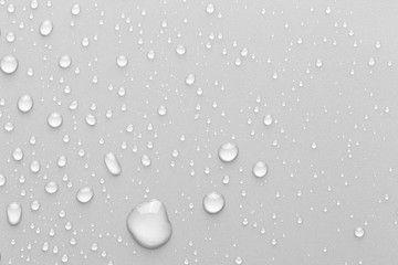 Drops of water on a color background
