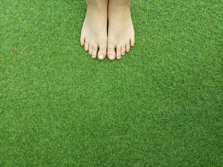 feet on the grass
