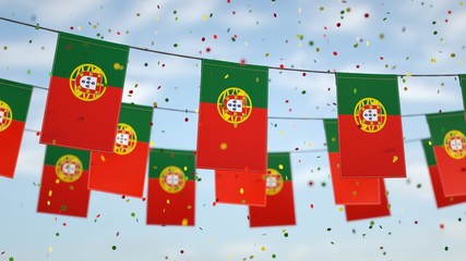 Portuguese flags in the sky with confetti.