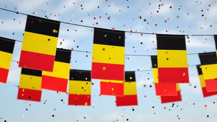 Belgians flags in the sky with confetti.