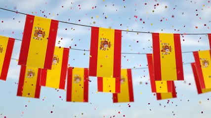 Spanish flags in the sky with confetti.