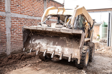 Excavator machine working on during a construction.