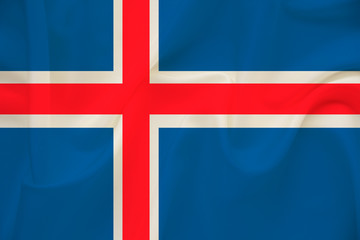 Fototapeta premium national flag of the country iceland on delicate silk with creases from the wind, concept of travel, immigration, politics, copy space, close-up