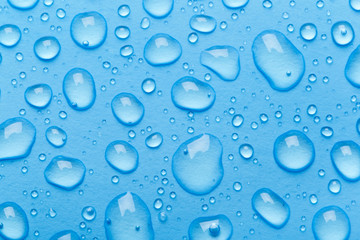 Blue water drops background
