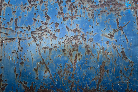 Full frame of blue rusted galvanized iron playground