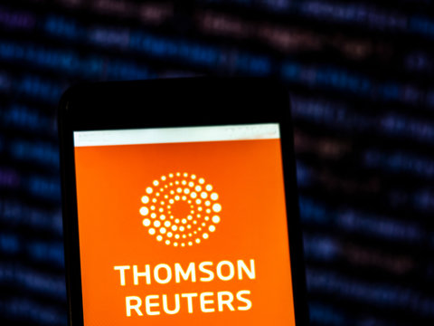 Kiev, Ukraine, November 22, 2018, illustrative editorial.  Thomson Reuters Corporation Mass media company logo seen displayed on smart phone.