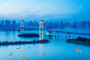Fototapeta premium Tokyo Tower skyline and Rainbow Bridge with cityscape at Odaiba Japan
