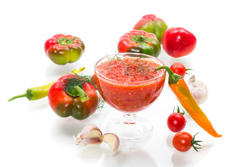 homemade hot adjika from tomatoes, hot and sweet peppers with spices