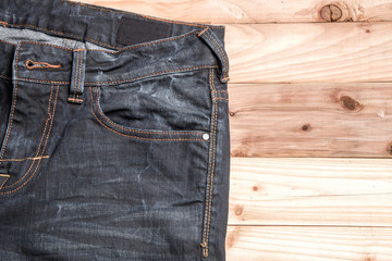 jeans on wooden background