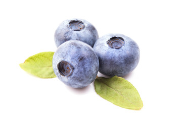 Blueberries with leaves isolated on white background