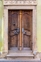 Baroque door at a historic building in the old town of Prague, Czech Republic