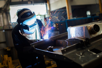 Fototapeta na wymiar welder Industrial automotive part in factory