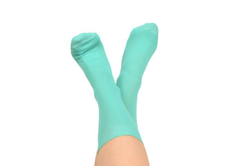 Woman in blue socks isolated on white background. Top view.