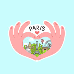Hands make heart with Paris inside