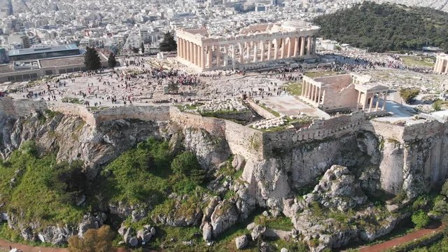 Acropolis with Partheon in Athens Historic Centre in Greece Crowded with Tourists, Famous Ancient Greece Attraction, Ancient Ruins with City Landscape and Downtown Aerial View