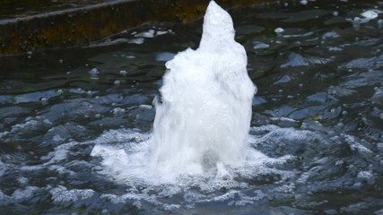 Video 4k of close up of small waterfall 