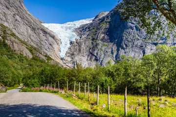 Briksdal glacier in Norway wel known arm of the large Jostedalsbreen glacier in Oldedalen valley in...