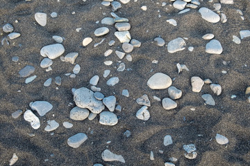 black sand beach with rock at Miho No Matsubara Beach, japan