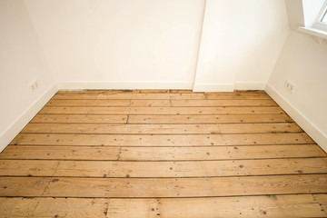 Wooden plank floor background texture close-up light colors