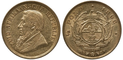 South African Republic Transvaal golden coin 1/2 half pound 1896, bust of President Krueger left, shield with lion, man and cart in front of crossed flags, eagle on top, ribbon with motto below,