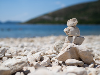 Stones stacked on the beach in Croatia