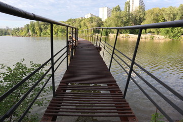 wooden bridge over lake