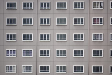 Windows in a row on facade of apartment building