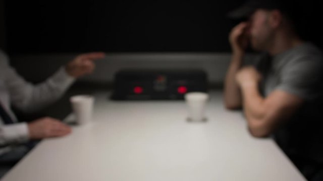 Police Station Custody Interview Room - Angry Detective Questioning Suspect