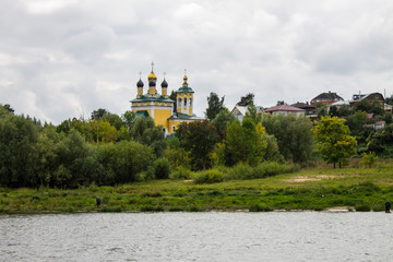  yellow Nikolo-embankment temple on a cloudy summer day in Murom Russia