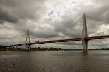 Cable-stayed bridge in Murom Russia across the Oka river on a summer cloudy day