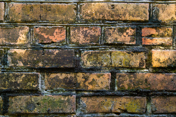 Old red brick. Brickwork. Old brickwork. The wall is built of red brick. Architectural texture.