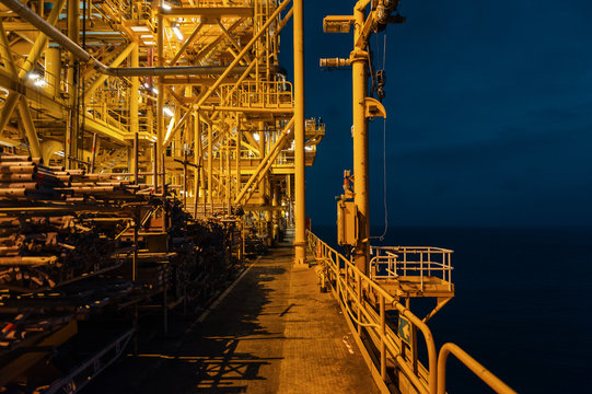 Oil and gas platform during night