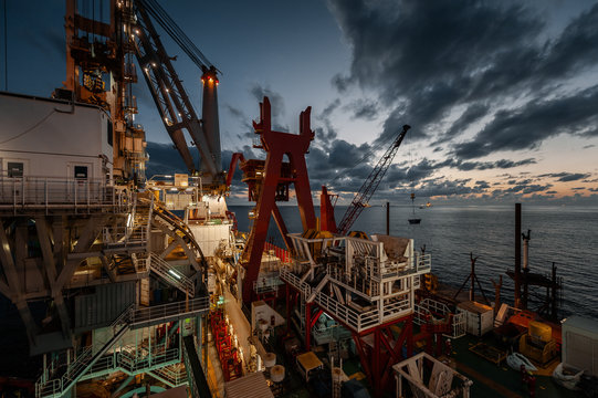 Front angle view of vessel at sunset