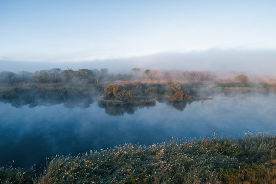Sunrise at Cubango river in cold morning