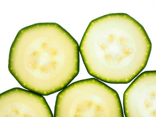 Slices zucchini isolated on white background