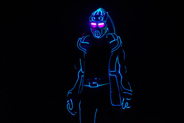 Cyborg on balck background. Led light suit entertainment
