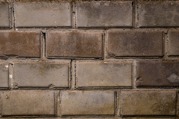 Old white brick. Brickwork. Old brickwork. The wall is built of white brick. Architectural texture. Silicate brick. Dirt on the wall.