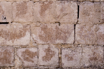 Old white brick. Brickwork. Old brickwork. The wall is built of white brick. Architectural texture. Silicate brick. Dirt on the wall.
