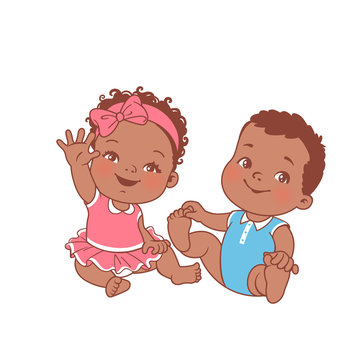 Cute little baby girl and boy sitting on white background. 